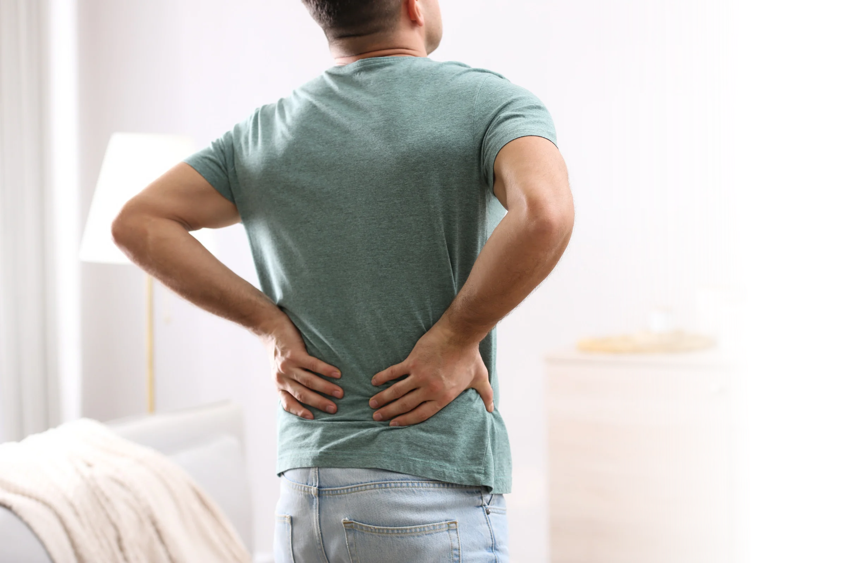 Person experiencing back pain